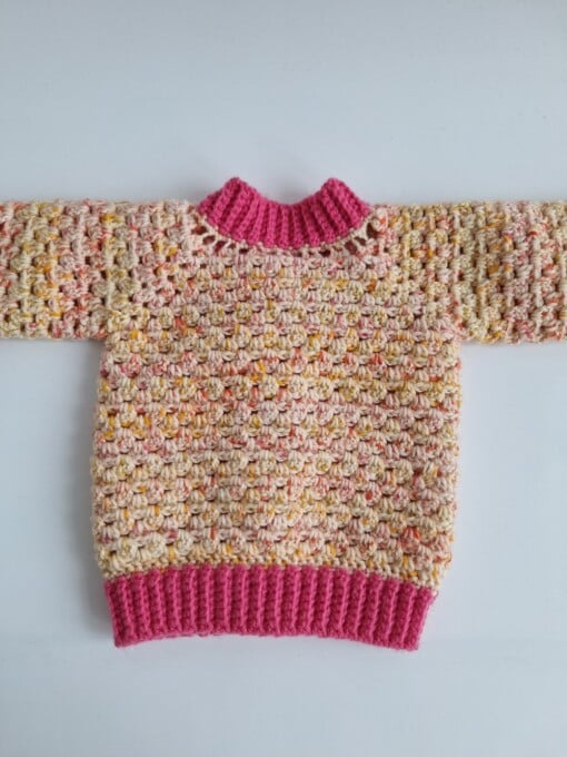 Gehaakt baby vestje | Roze en oranje gemêleerd