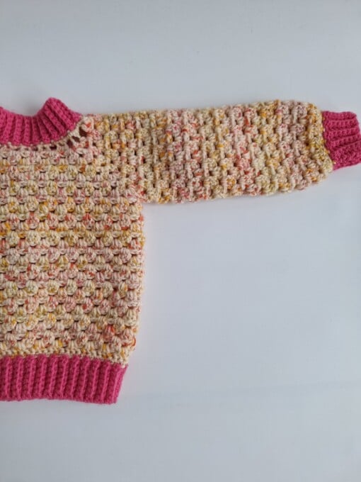Gehaakt baby vestje | Roze en oranje gemêleerd