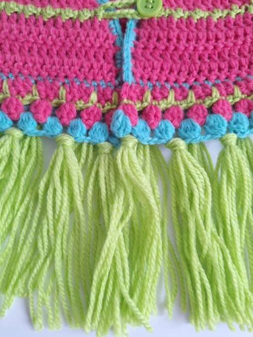 Gehaakt baby vestje | Roze, turquoise en groen met groene franjes