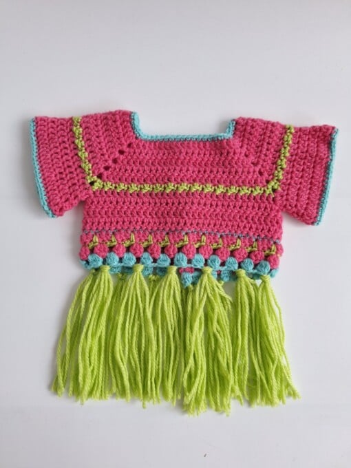 Gehaakt baby vestje | Roze, turquoise en groen met groene franjes