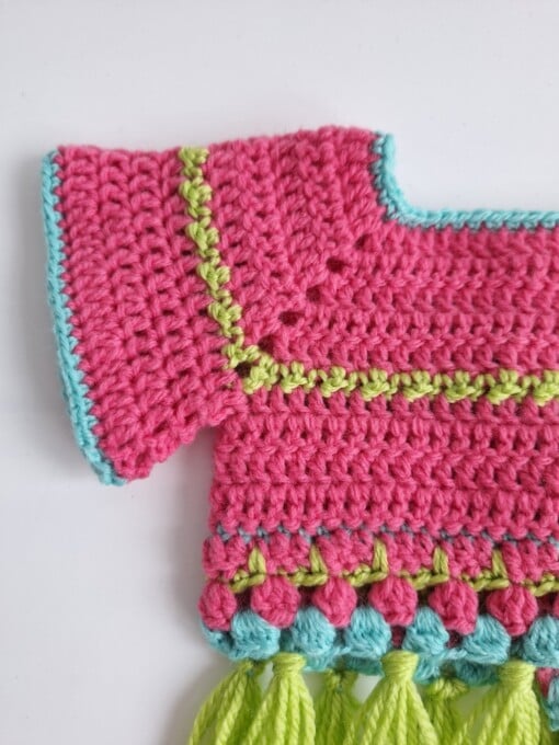 Gehaakt baby vestje | Roze, turquoise en groen met groene franjes