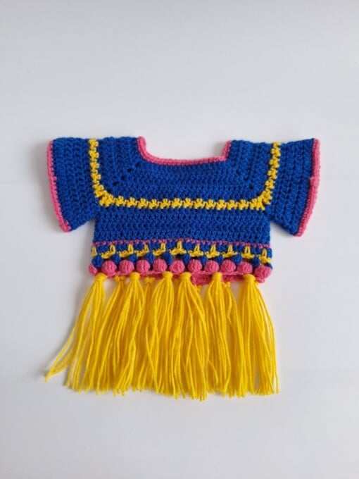 Gehaakt baby vestje | Blauw, roze en geel met gele franjes