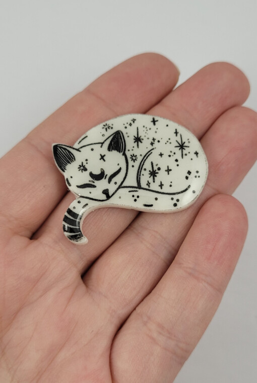 Slapende kosmische glow in the dark kitten magneet