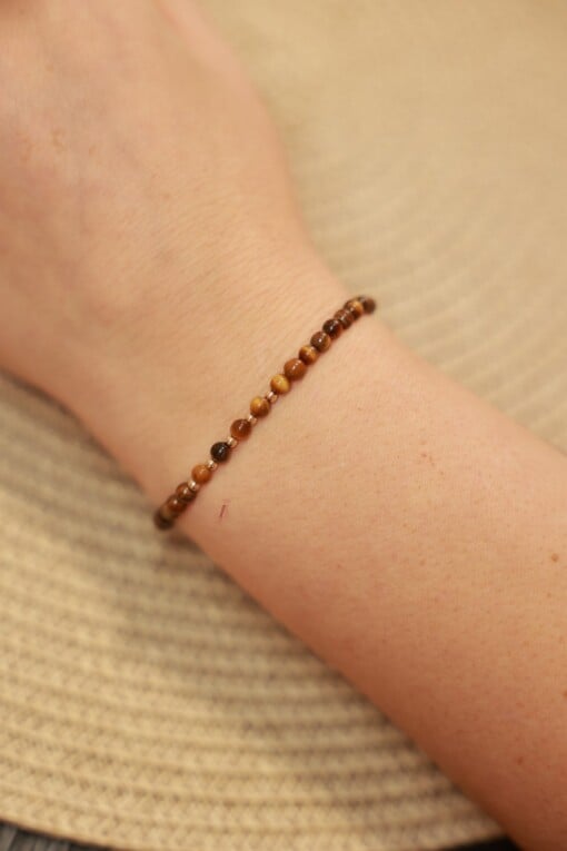 Elegante Tijgeroog armband met 14 karaat geelgouden kralen