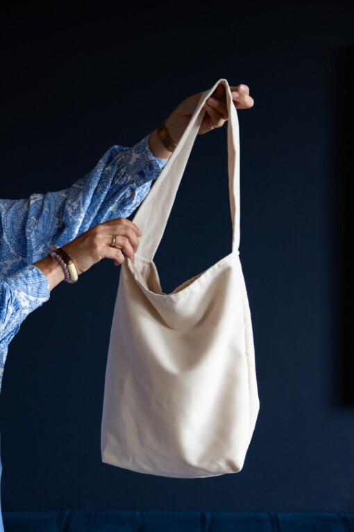 Fluwelen tas met driehoek in wol met gouddetail