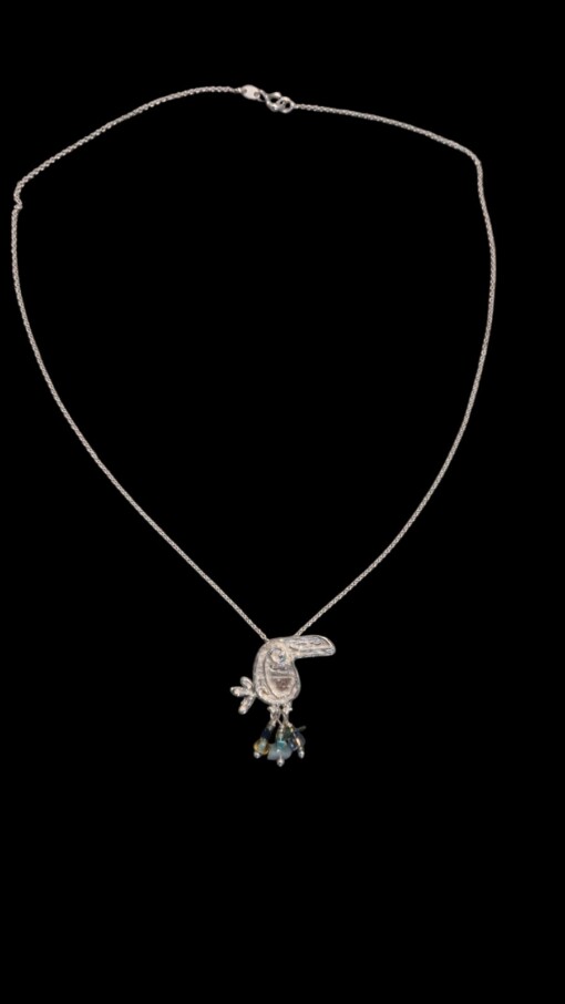 Unieke zilveren hanger toekan Noukie met turquoise kraaltjes