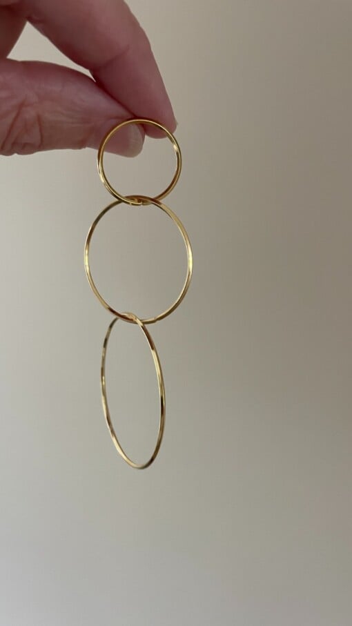 Lange gouden oorbellen