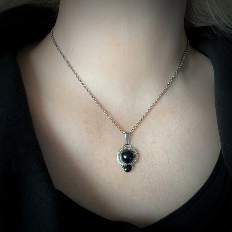 Handgemaakte zilveren hanger met onyx