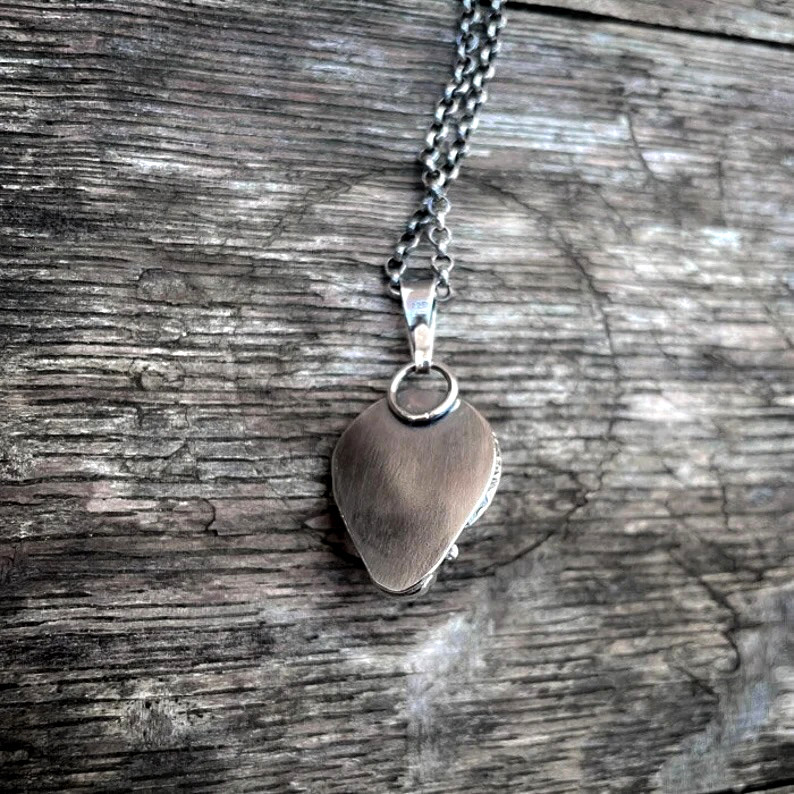 Handgemaakte zilveren hanger met onyx