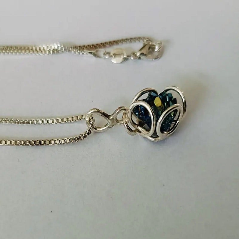 Zilveren hanger met blauwe Regenboog amethist - 76142.jpeg Zilveren hanger met regenboog amethist