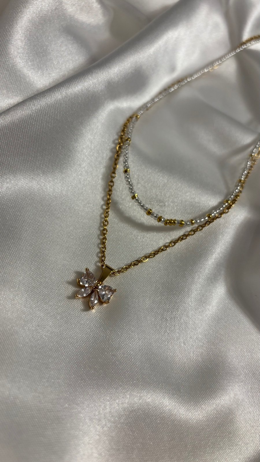 Luxe Goudkleurige Layering Ketting Set met Glinsterende Strik Hanger