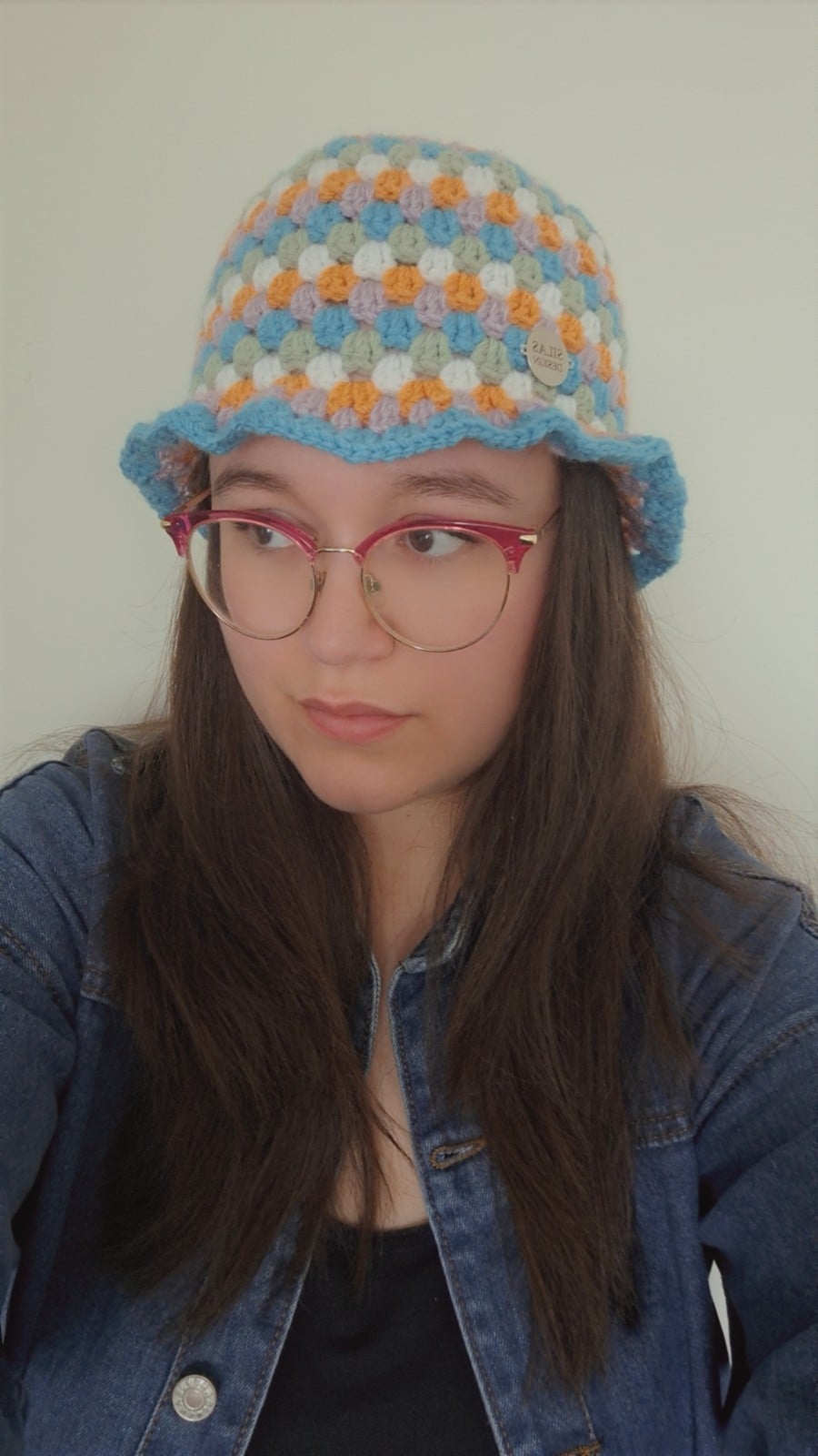 Gehaakte bucket hat | Oranje, lila, turquoise, sagegroen en wit