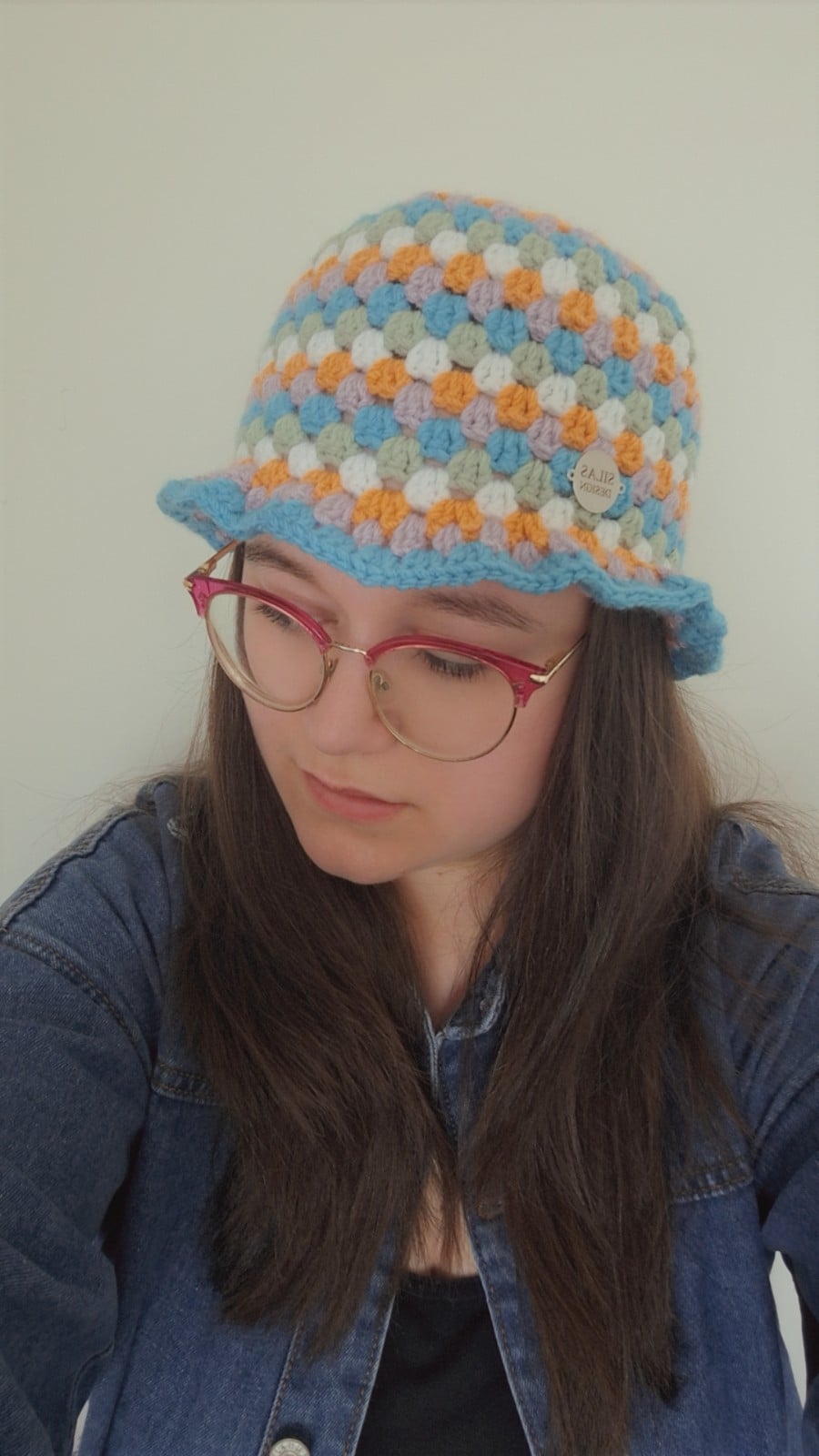 Gehaakte bucket hat | Oranje, lila, turquoise, sagegroen en wit